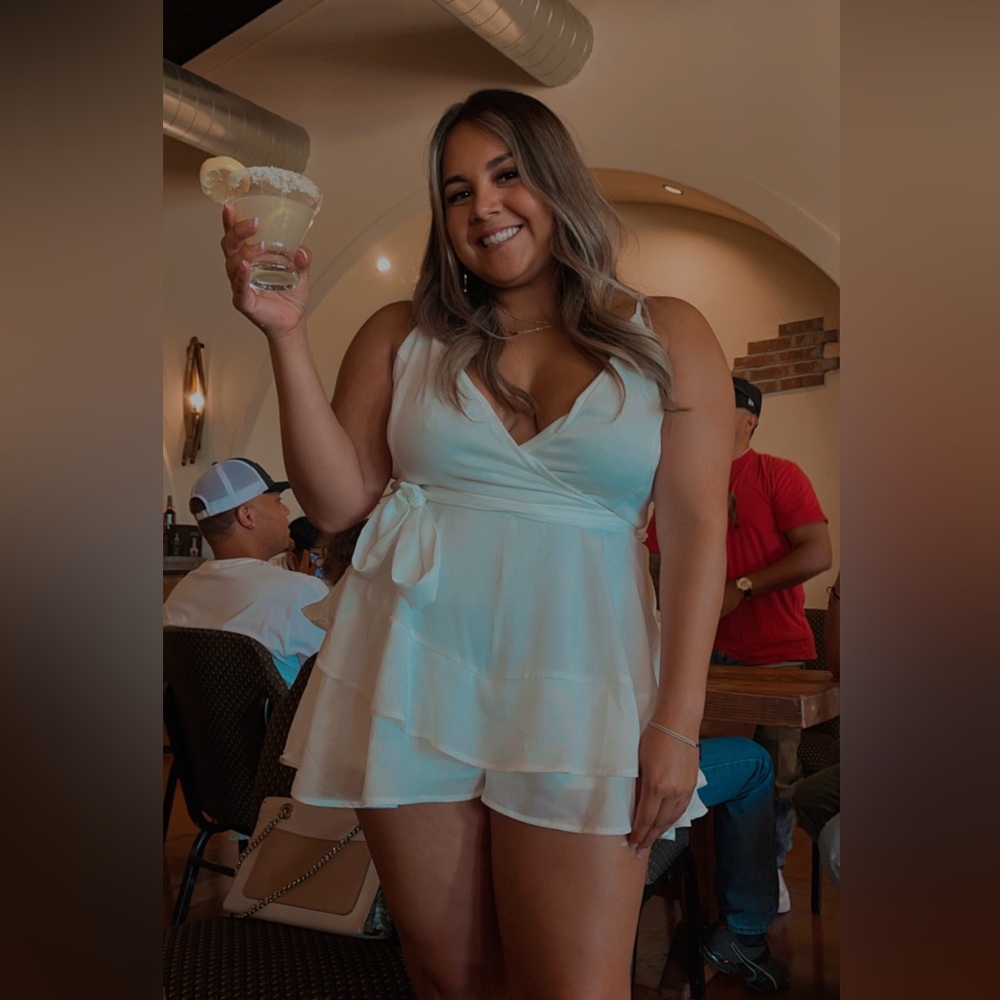 Large white Altard state romper.